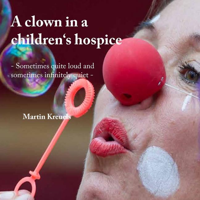 A clown in a children's hospice main product photo