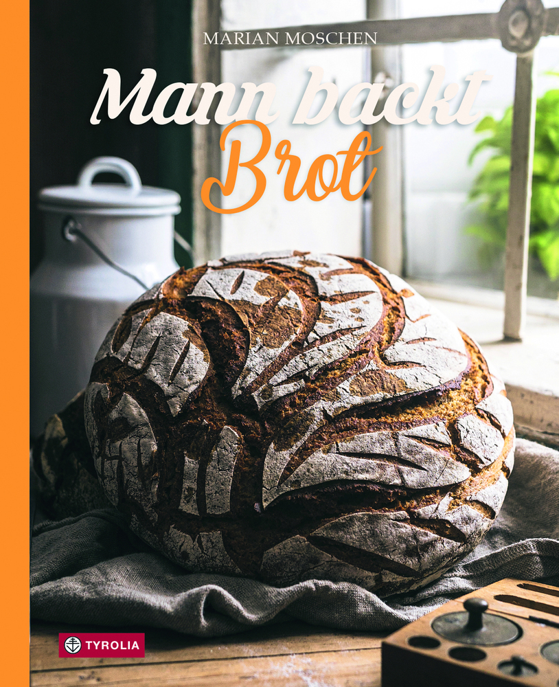 Mann backt Brot main product photo
