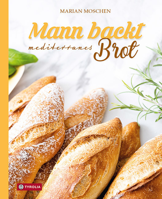 Mann backt mediterranes Brot main product photo
