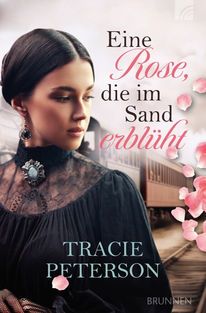 Eine Rose, die im Sand erblüht main product photo