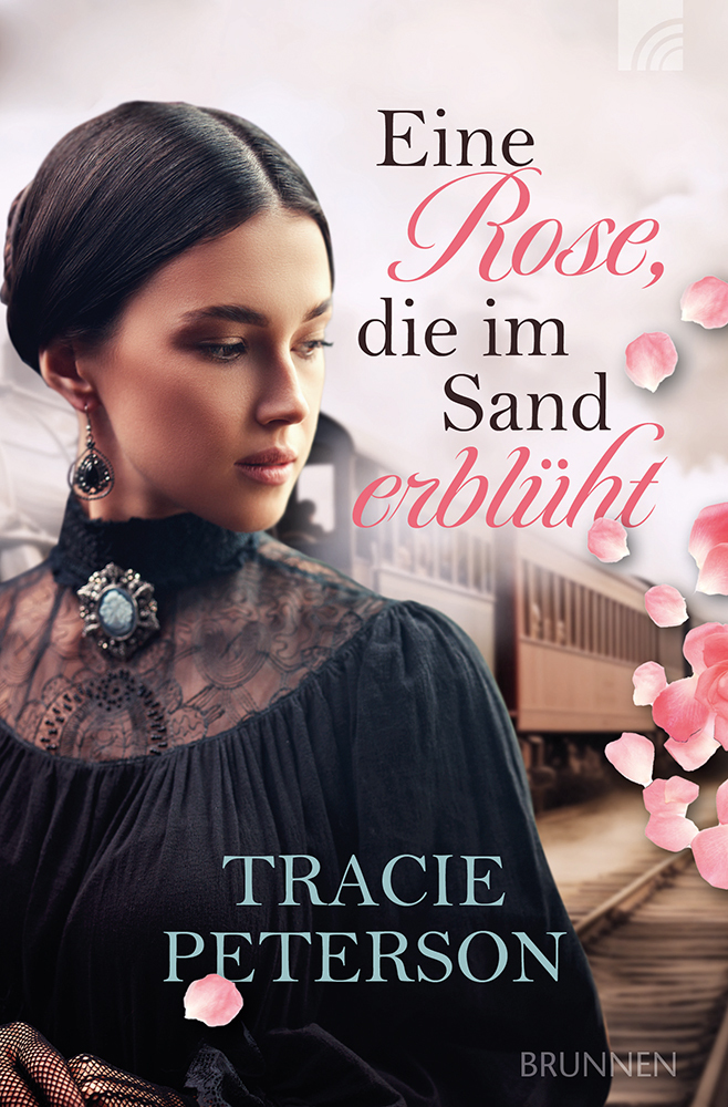 Eine Rose, die im Sand erblüht main product photo