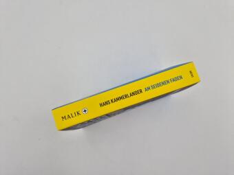 Am seidenen Faden